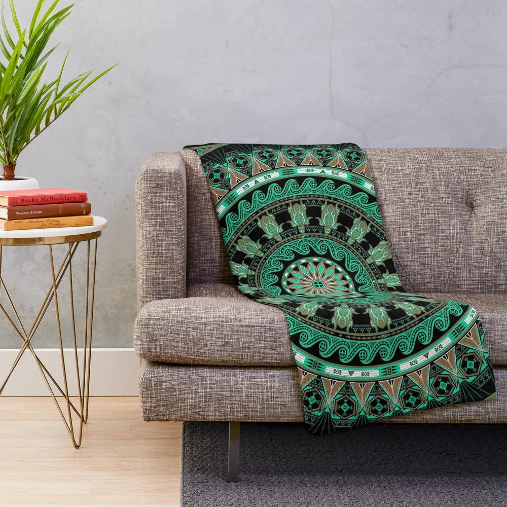 Soft green turtle plush blanket with tribal and ocean-themed graphics