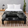 Soft grey plush blanket with butterfly motif, inspired by the character Newt from The Maze Runner