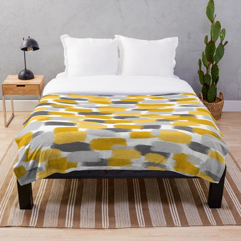 Grey and mustard yellow abstract paint brush effect plush blanket