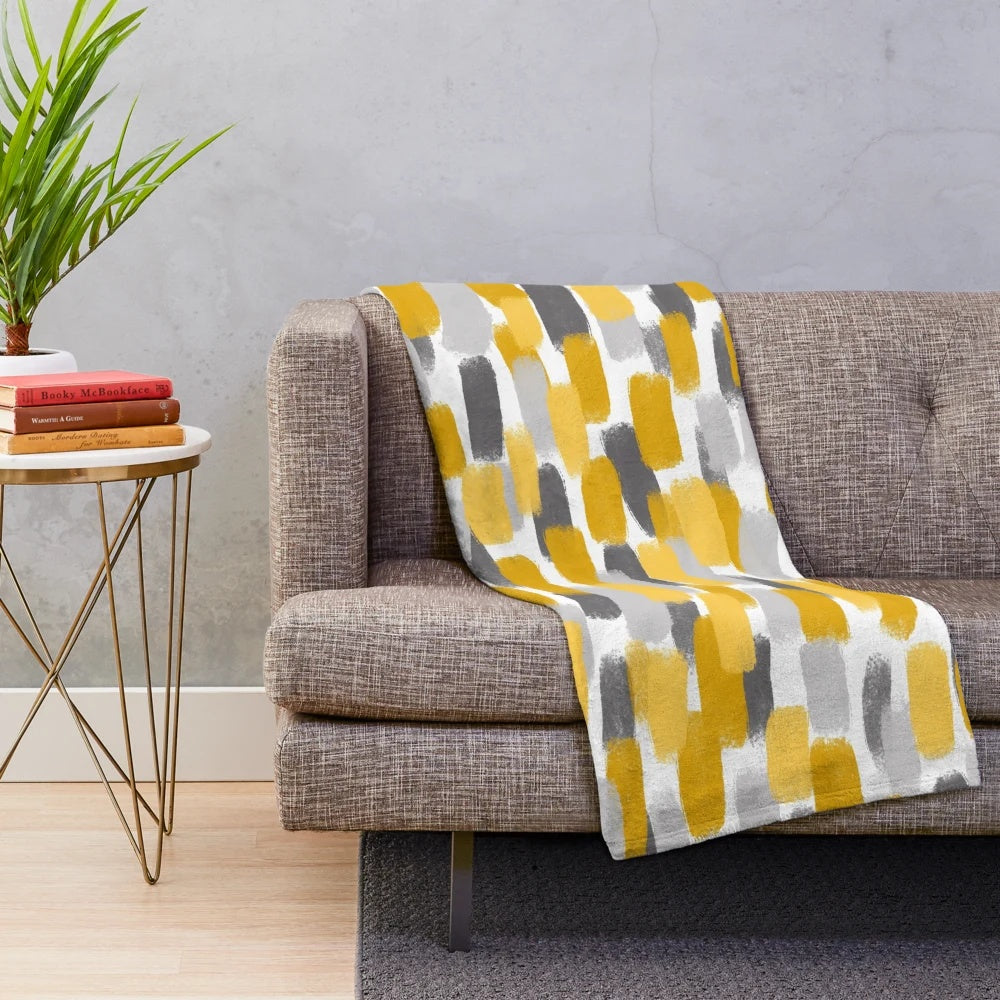 Grey and mustard yellow abstract paint brush effect plush blanket