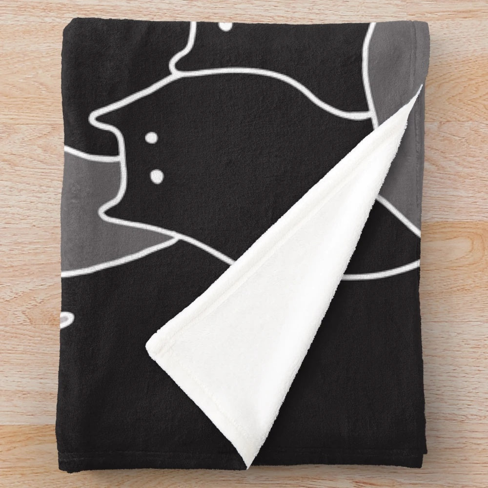 Grey plush blanket with a whimsical hand-drawn cats illustration in black and white line art