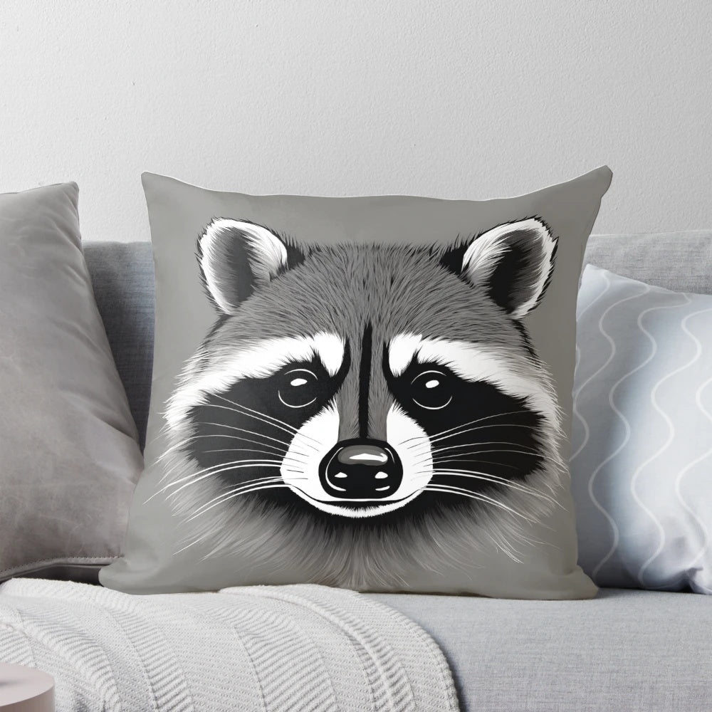 A soft, grey pillow with a playful raccoon print design.