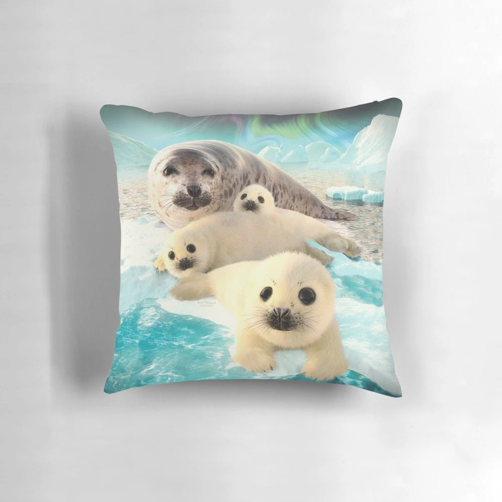 Soft, decorative pillow featuring a grey seal pup in the arctic landscape