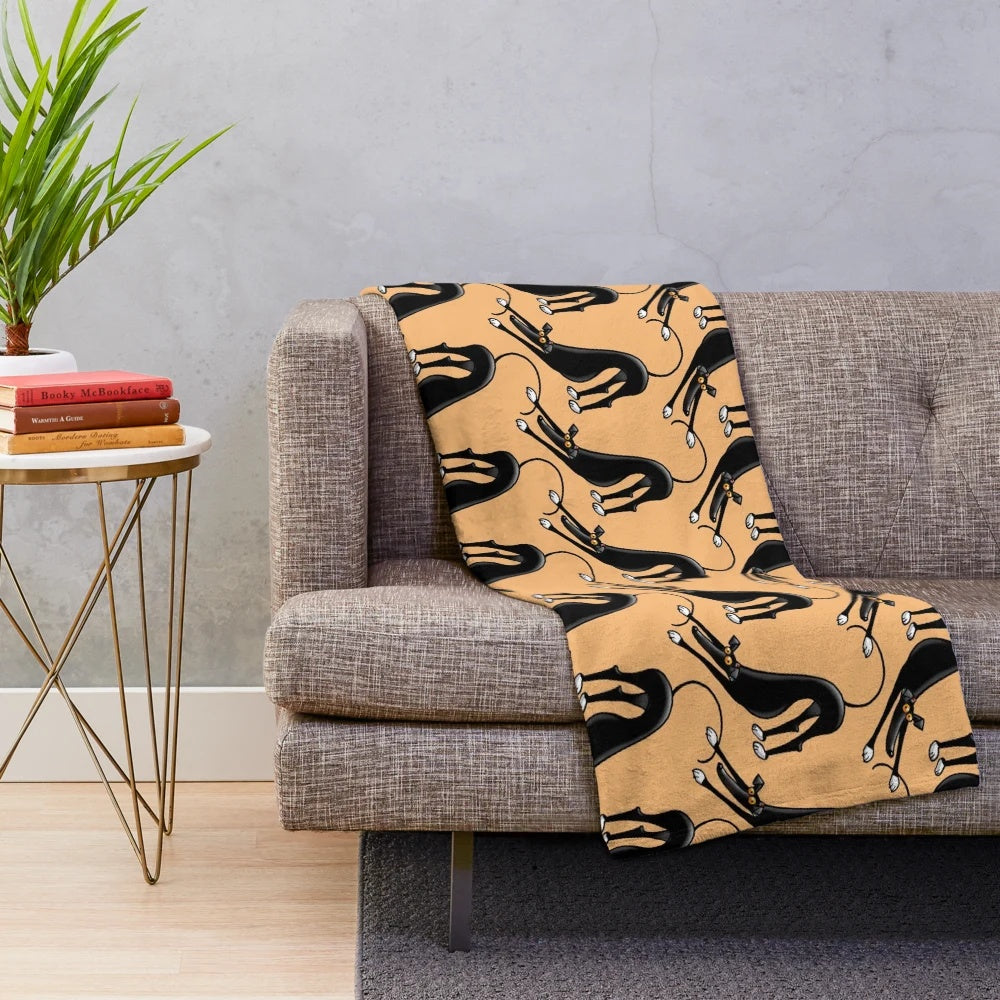 Greyhound inspired plush blanket featuring a cartoon design by artist Rich Skipworth