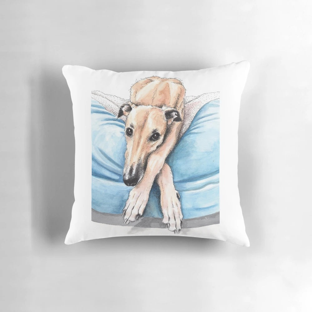 Decorative pillow featuring a stylized greyhound or whippet design in blue and white