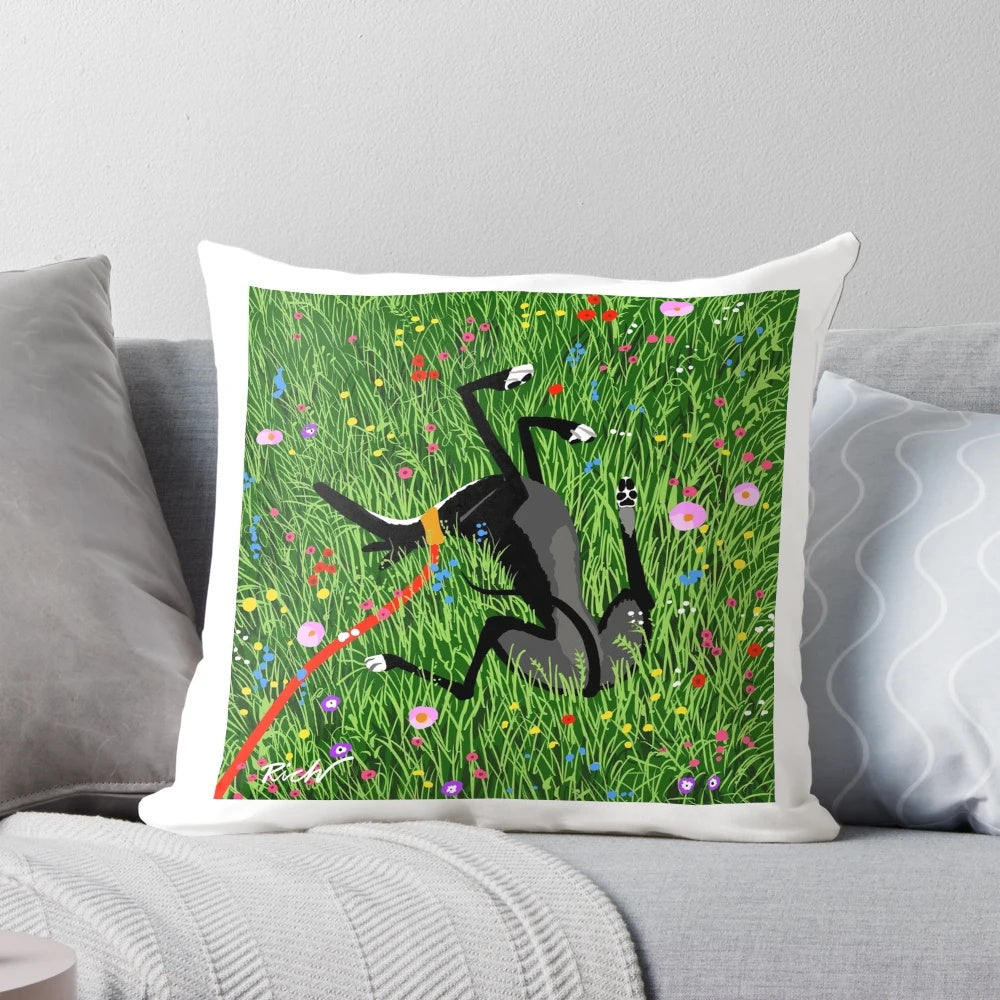 Decorative pillow featuring a greyhound dog resting in a field of colorful wildflowers