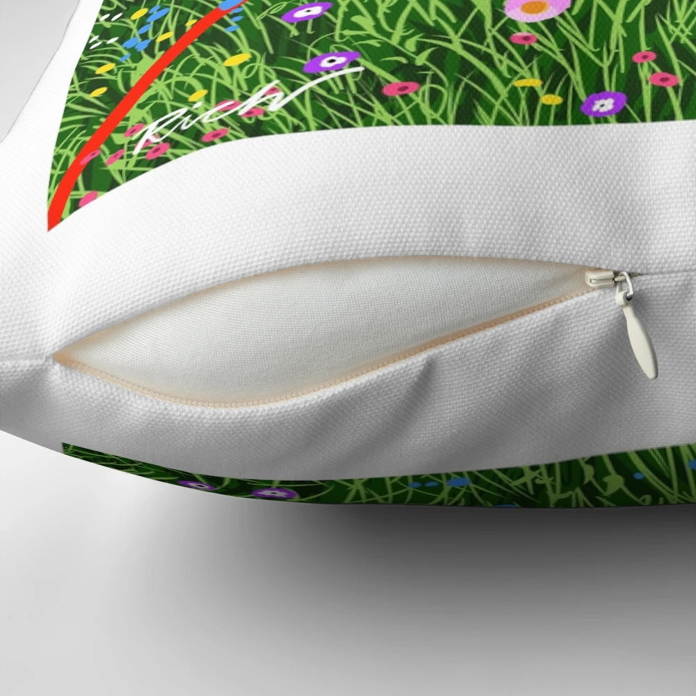 Decorative pillow featuring a greyhound dog resting in a field of colorful wildflowers