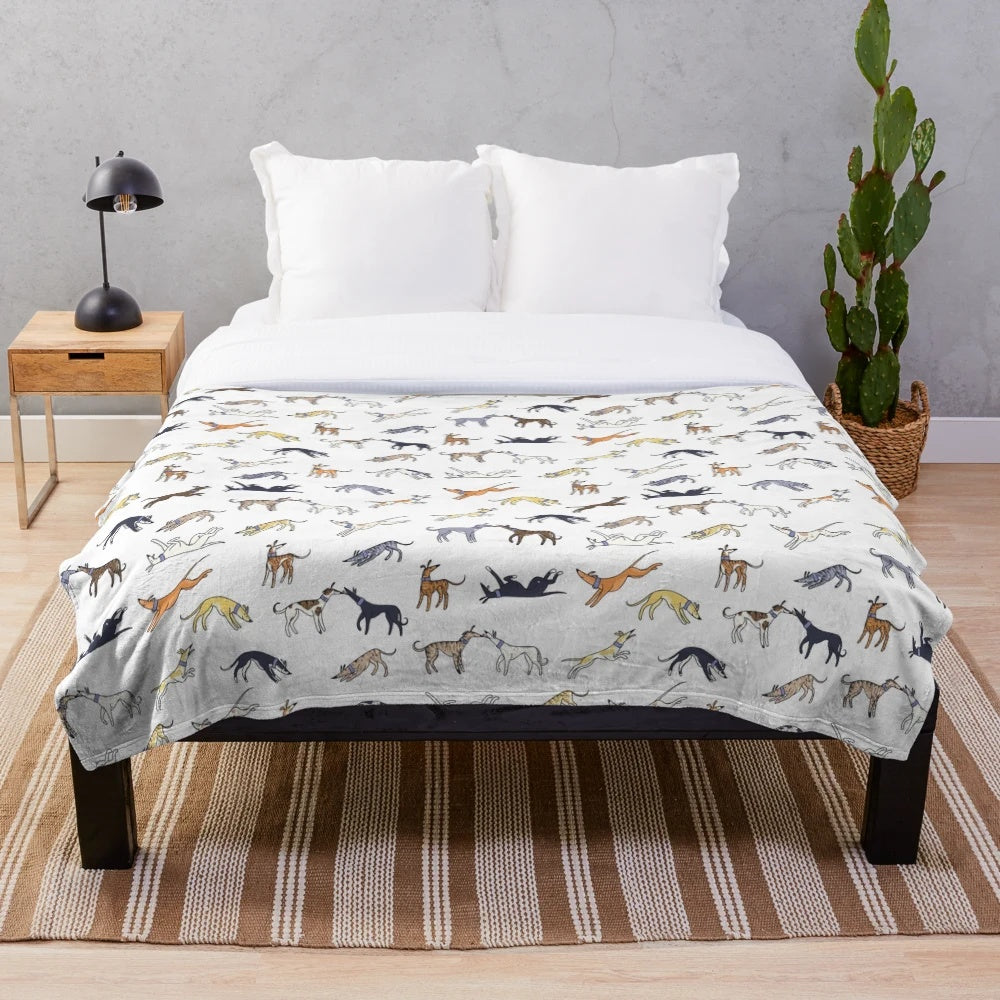 A soft and plush blanket featuring a greyhound design