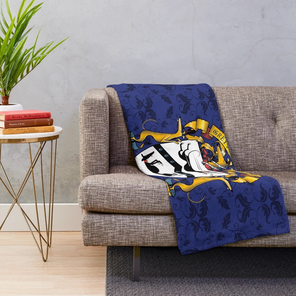 Greyhound plush blanket with heraldic-inspired black dog design