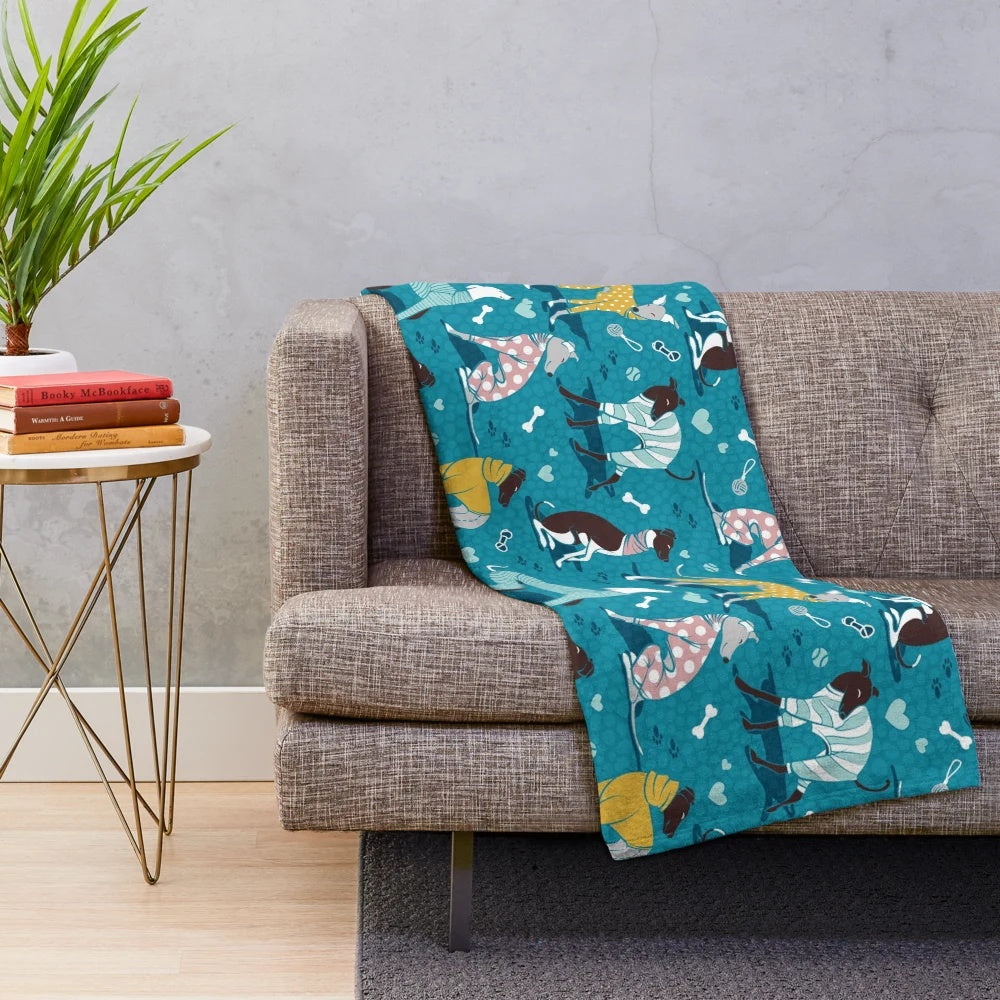 Greyhound plush blanket with turquoise and white design