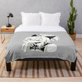 Greyscale plush blanket with a minimalist, anime-inspired design