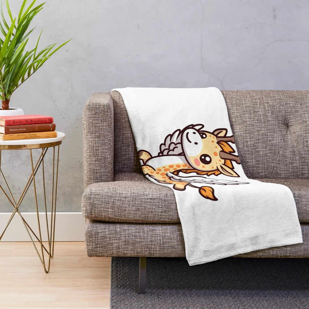 A plush griffon or gryphon creature blanket for medieval fantasy home decor.