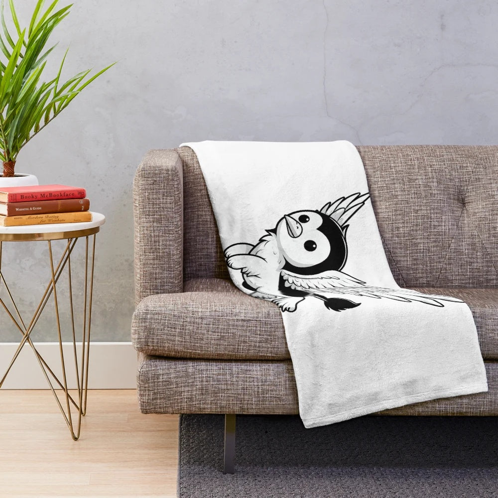 Griffon plush blanket featuring a cuddly mythical creature design