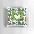 Soft and plush Grinchmas-themed Christmas pillow with green Grinch design, perfect for holiday home decor.