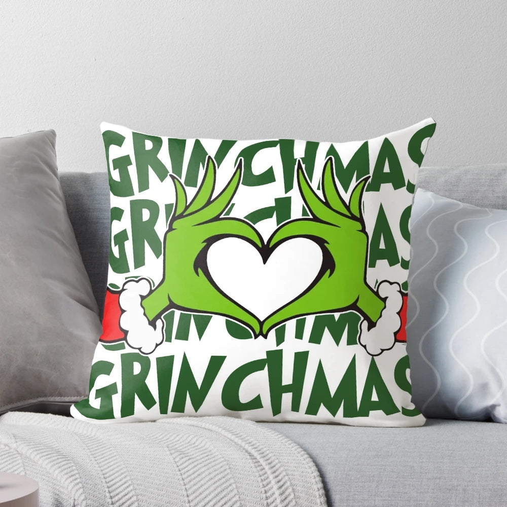 Soft and plush Grinchmas-themed Christmas pillow with green Grinch design, perfect for holiday home decor.