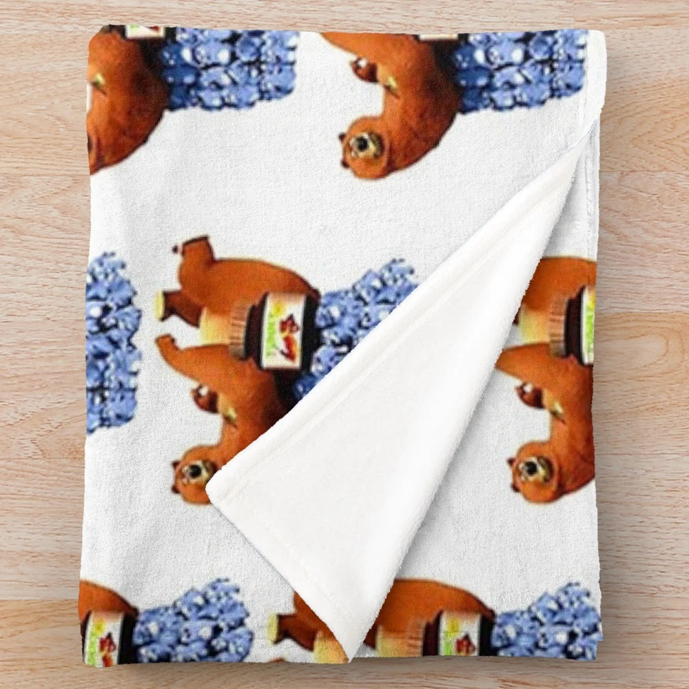 Grizzy and Lemmings cartoon characters on a soft plush blanket