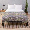 Soft and fluffy guinea pig plush blanket with a vibrant floral garden pattern