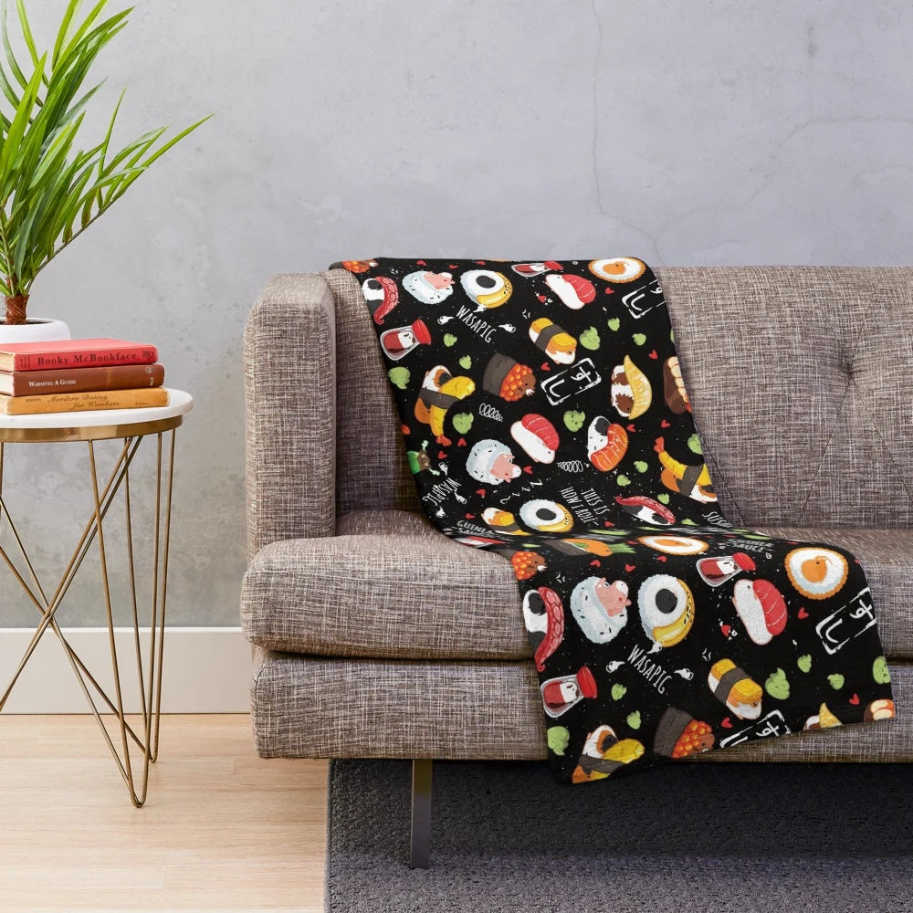 Plush blanket with cute guinea pig sushi design on black background