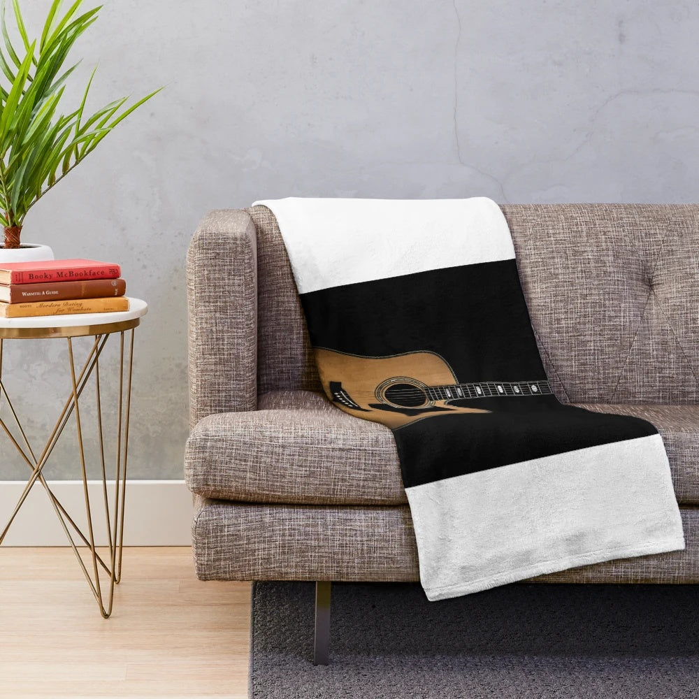 Guitar plush blanket featuring an acoustic guitar design