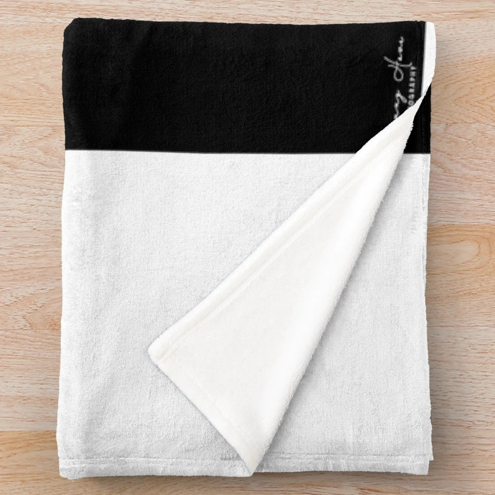Guitar plush blanket featuring an acoustic guitar design