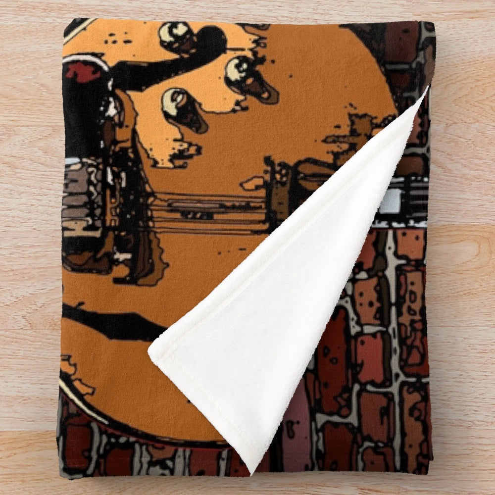 Plush blanket featuring three guitars in a musical design