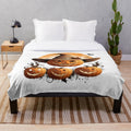 Cozy Halloween-themed plush blanket