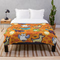 Halloween-themed plush blanket with whimsical design