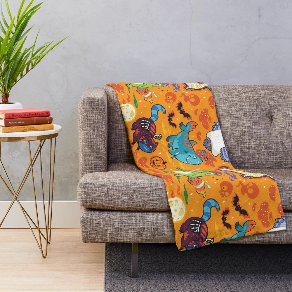Halloween-themed plush blanket with whimsical design