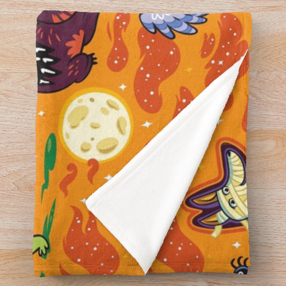 Halloween-themed plush blanket with whimsical design