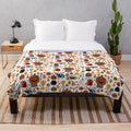 Soft and plush Halloweentown-themed blanket with pumpkins and leaves