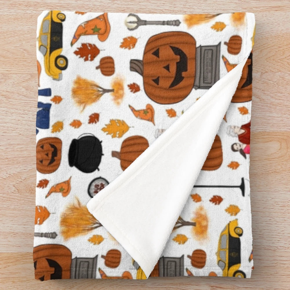 Soft and plush Halloweentown-themed blanket with pumpkins and leaves