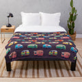 Soft and cozy plush blanket featuring a happy camper design