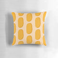 A colorful, cartoon-inspired hash brown doodle pillow with a playful, brown and orange design.