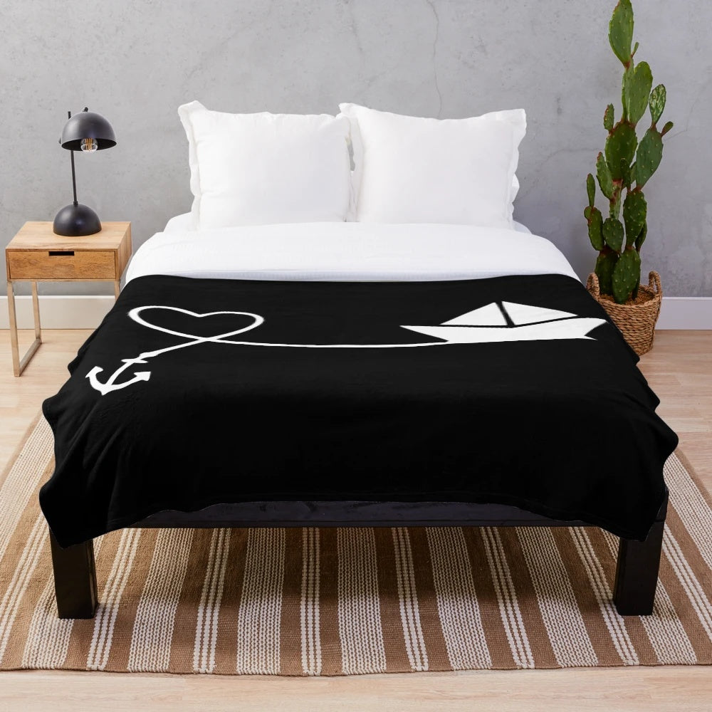 Plush blanket with heart anchor boat design for water sports and nautical enthusiasts