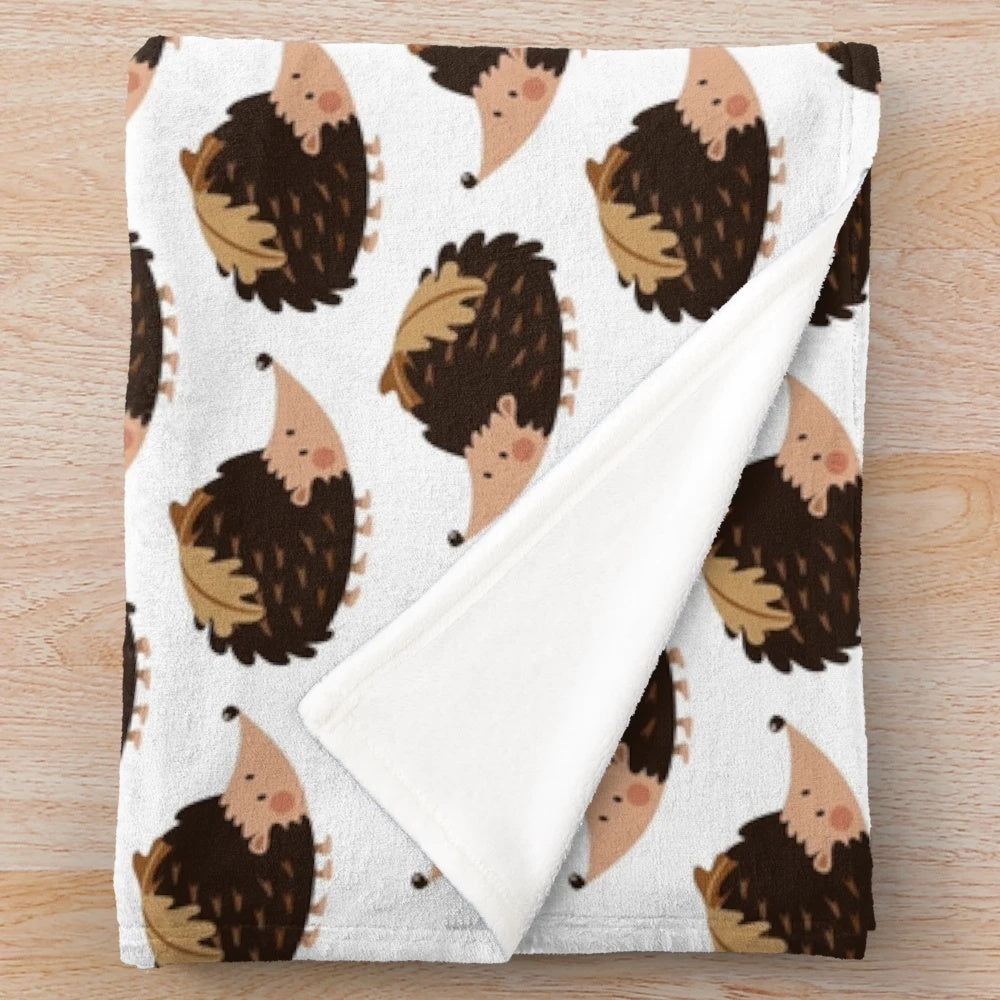 Hedgehog and oak leaves pattern on a soft, plush blanket