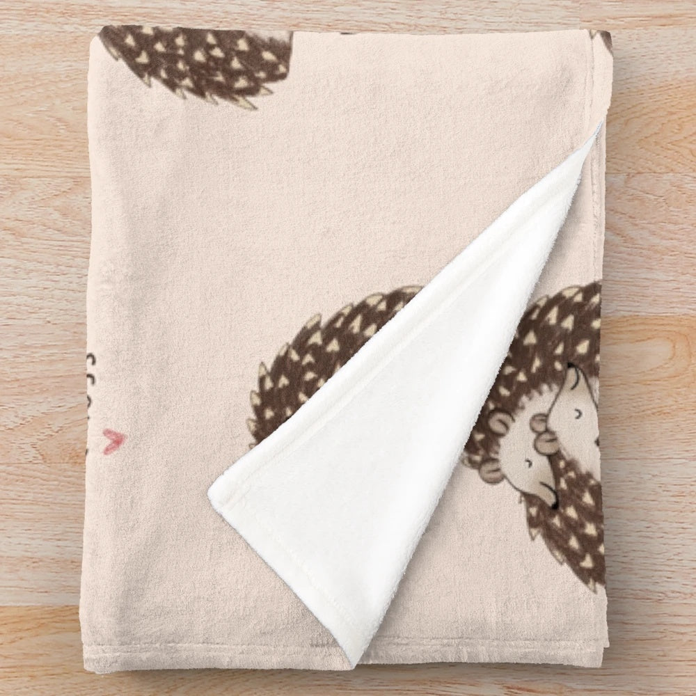 Soft and cuddly hedgehog plush blanket