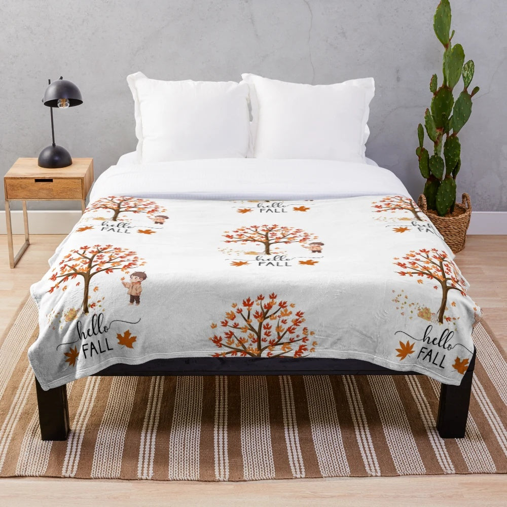 Cozy plush blanket with autumn leaf design
