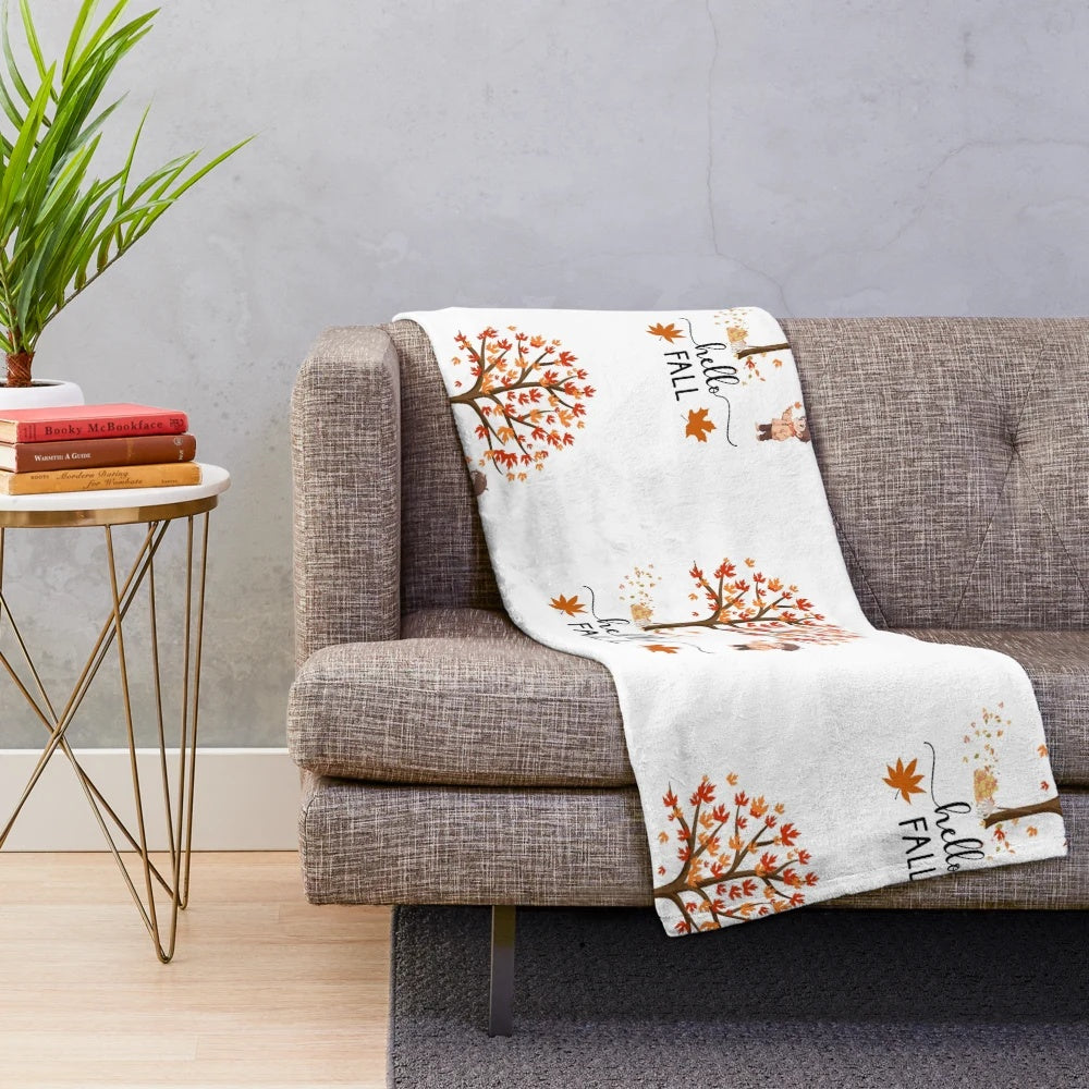 Cozy plush blanket with autumn leaf design