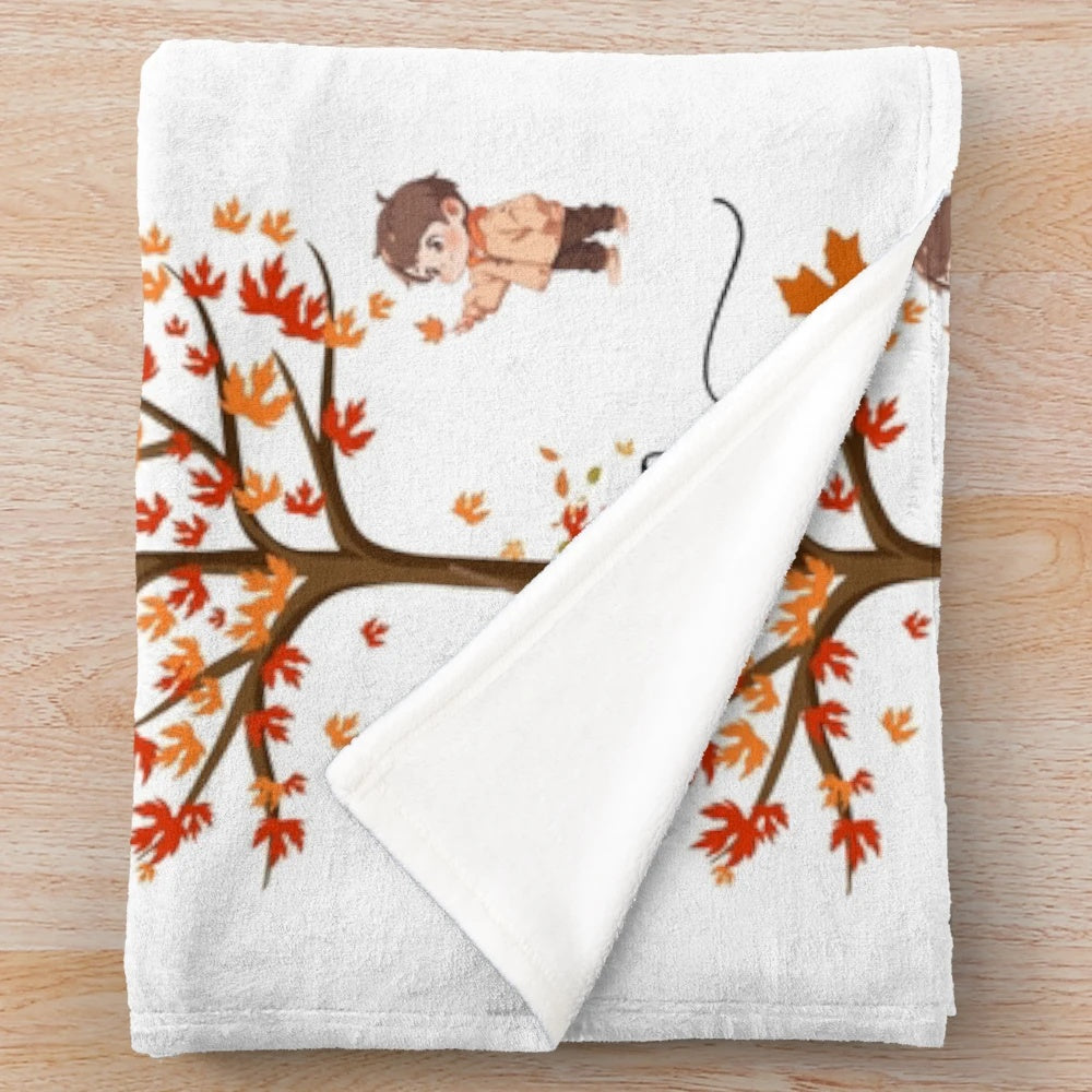 Cozy plush blanket with autumn leaf design