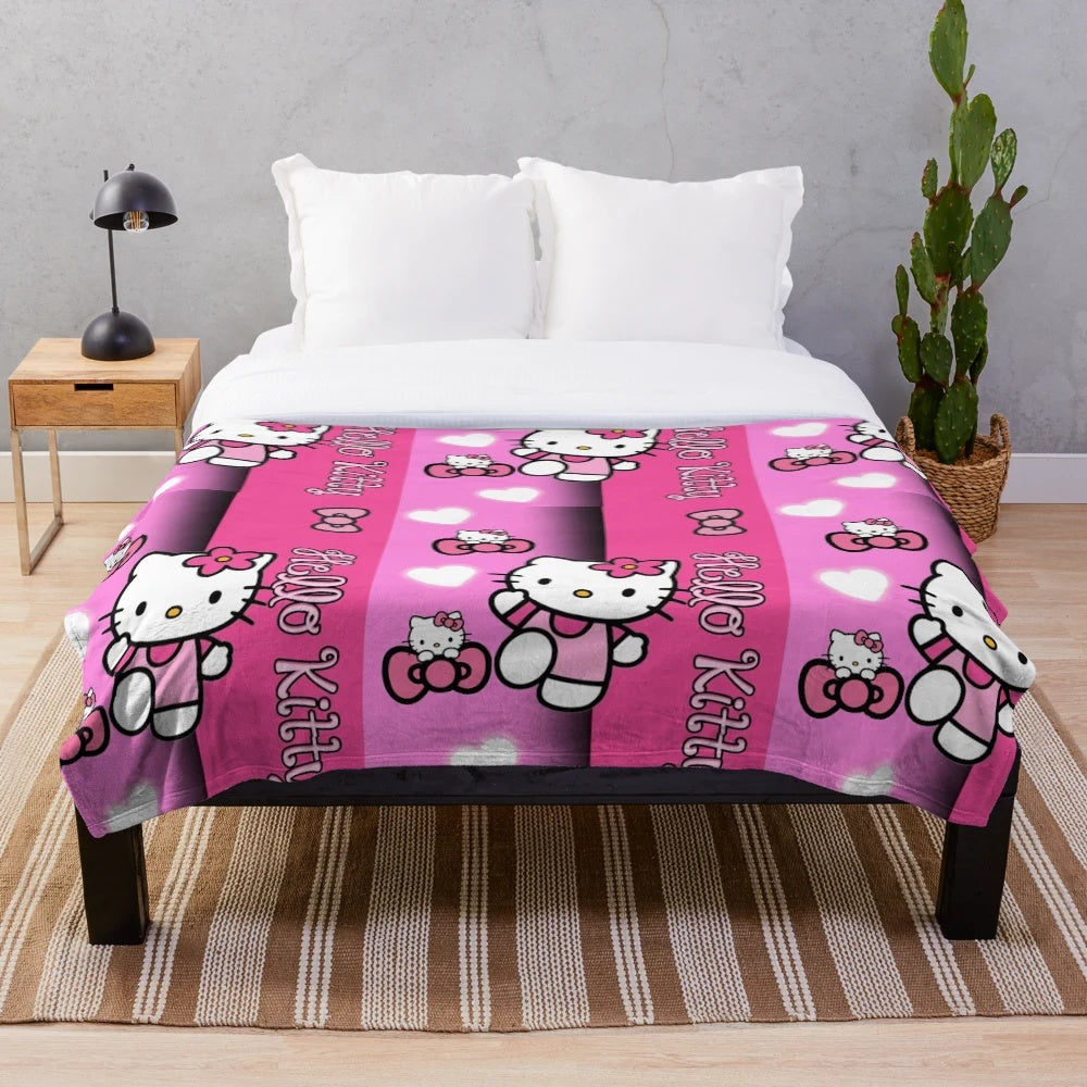 Soft and plush pink blanket with a Hello Kitty inspired design