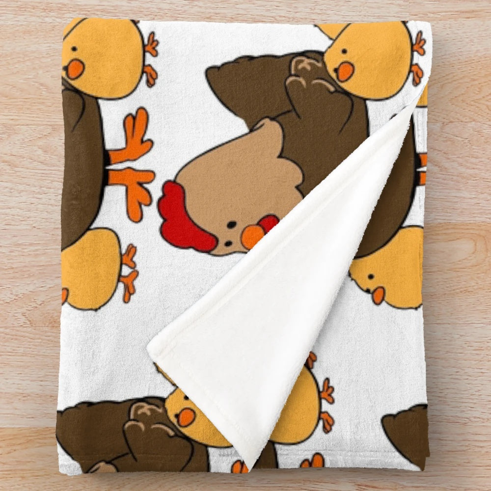 Soft and cuddly plush blanket with a charming hen and chickens pattern, perfect for farmhouse style decor