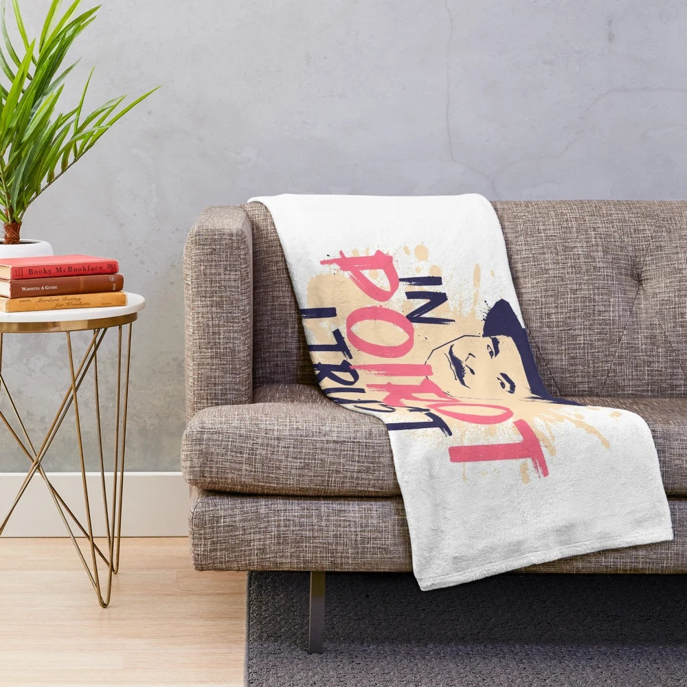 Soft, plush blanket featuring the iconic detective Hercule Poirot from Agatha Christie's mystery novels