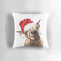 Soft, plush Highland cow Christmas pillow with festive holiday design