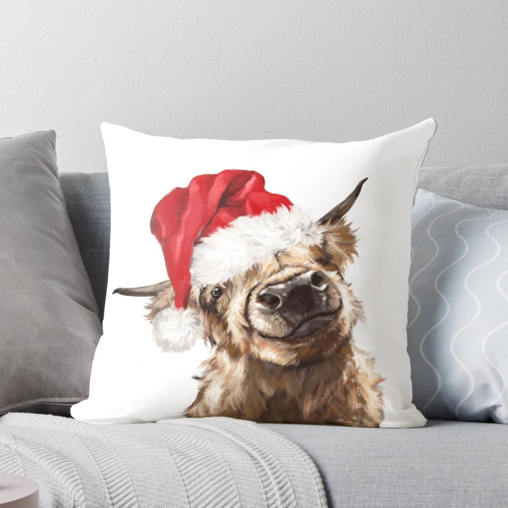 Soft, plush Highland cow Christmas pillow with festive holiday design