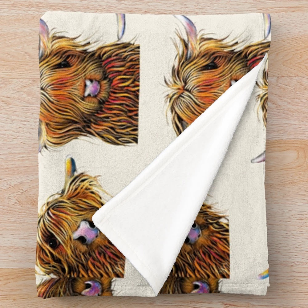 Soft and plush highland cow print blanket for home and nursery decor