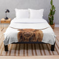 Highland cow plush blanket with watercolor design