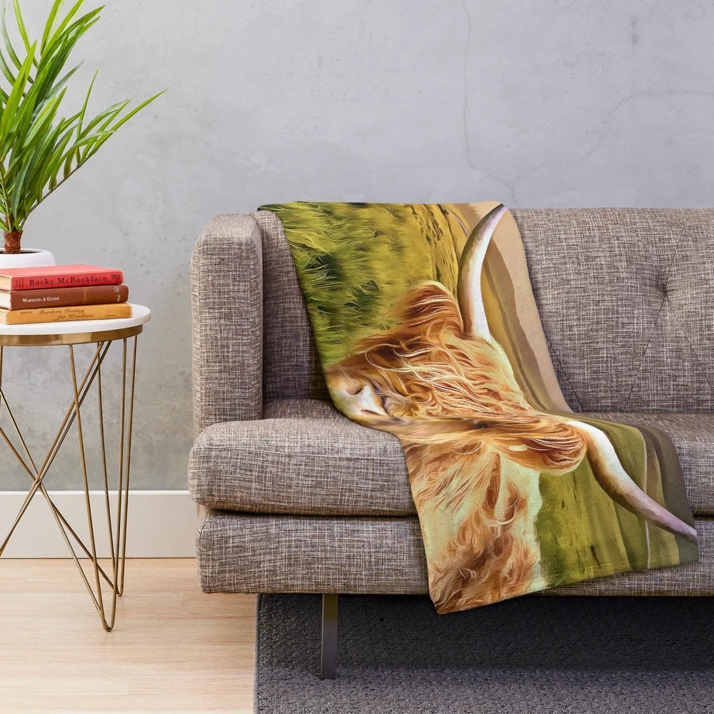 Plush blanket featuring a painting of a highland cow, a iconic Scottish breed, in the scenic highlands landscape