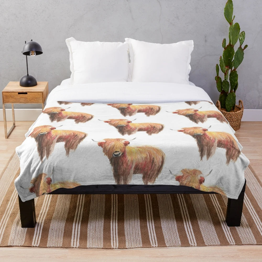 Soft and cuddly highland cow plush blanket with a watercolor design