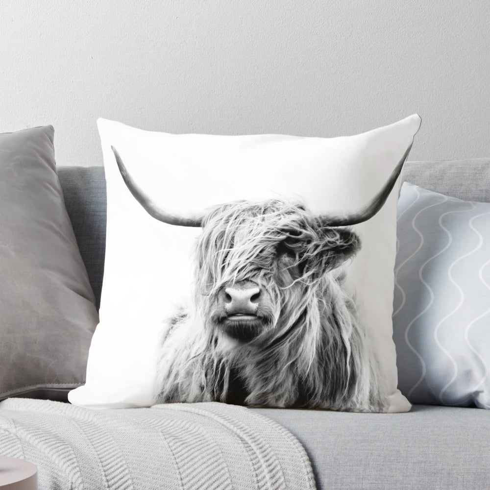 A cozy and rustic highland cow portrait depicted on a soft pillow for home decor.