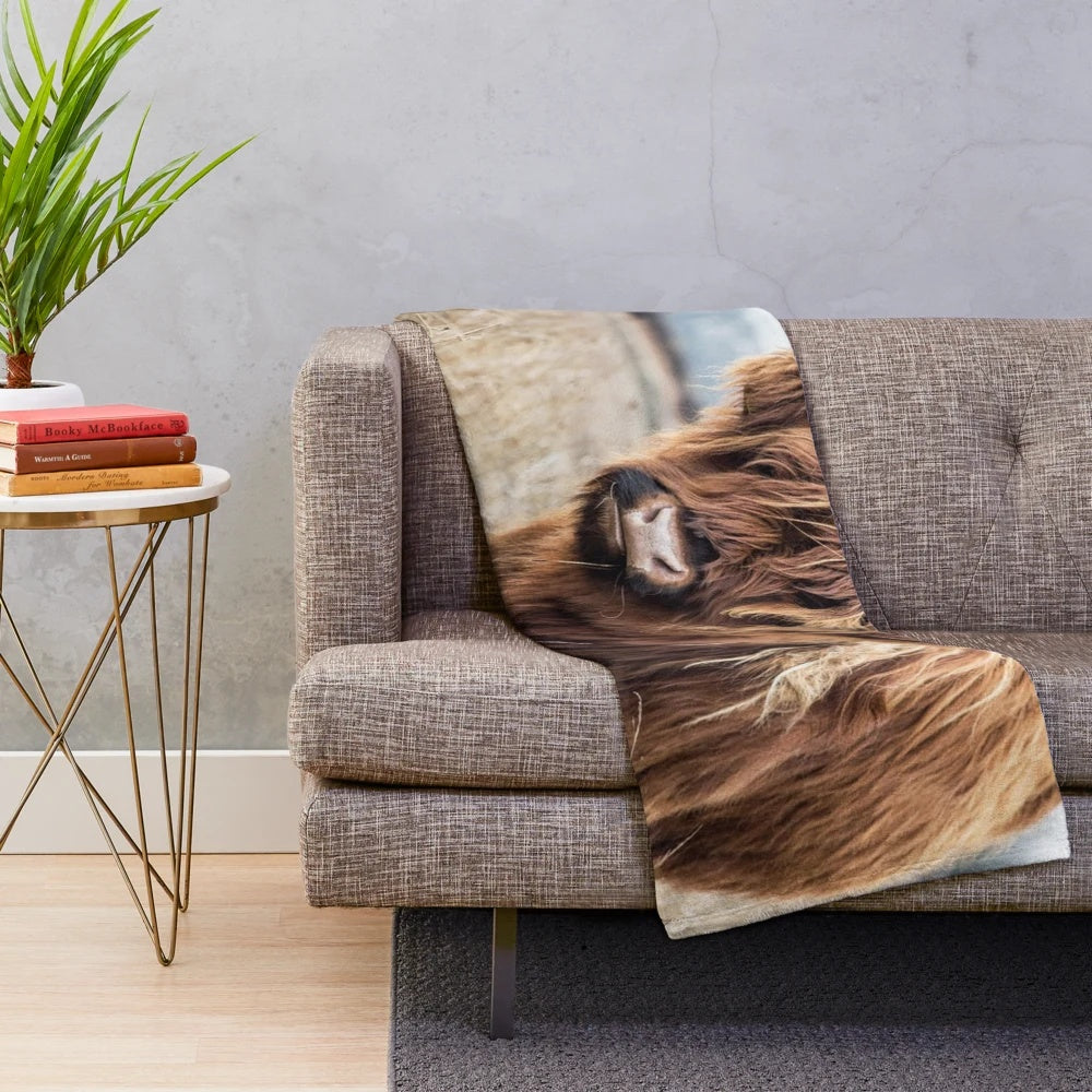 Plush blanket featuring a highland cow portrait